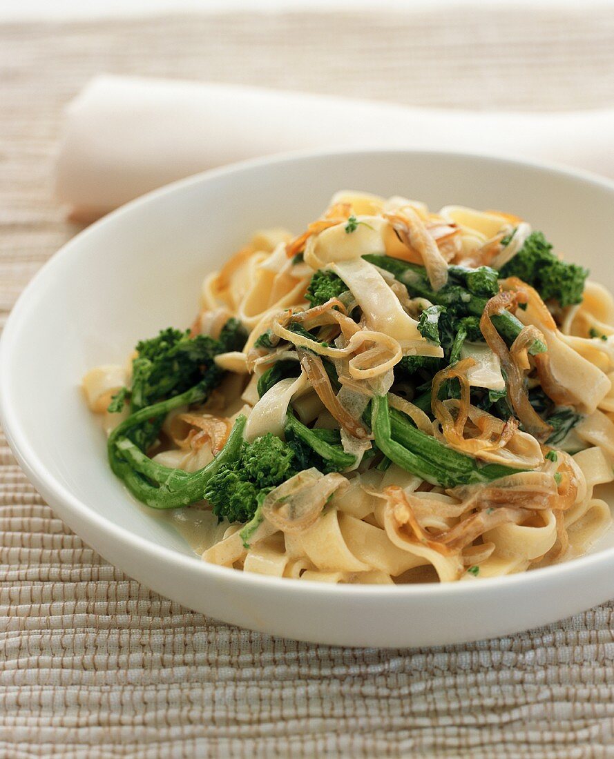 Bowl of Pasta with Broccoli Rabe and Onions