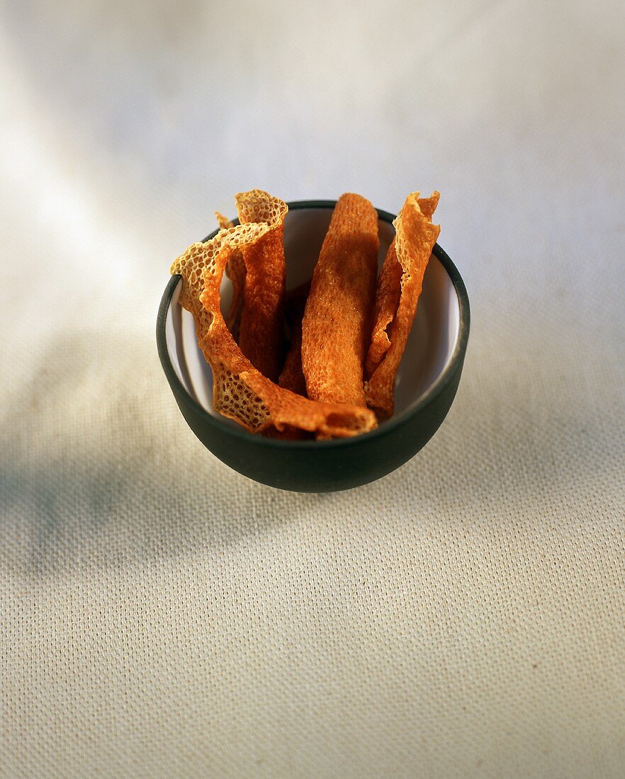 Dried Orange Peels in a Small Bowl