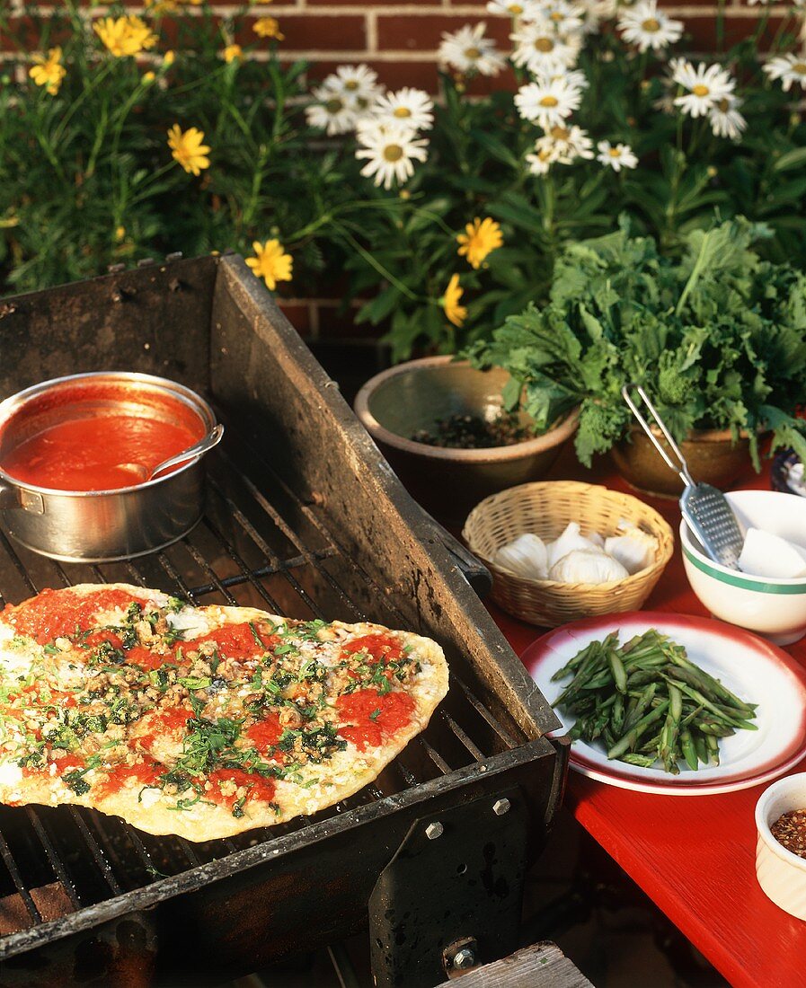 Grilled Pizza; On the Grill with Ingredients