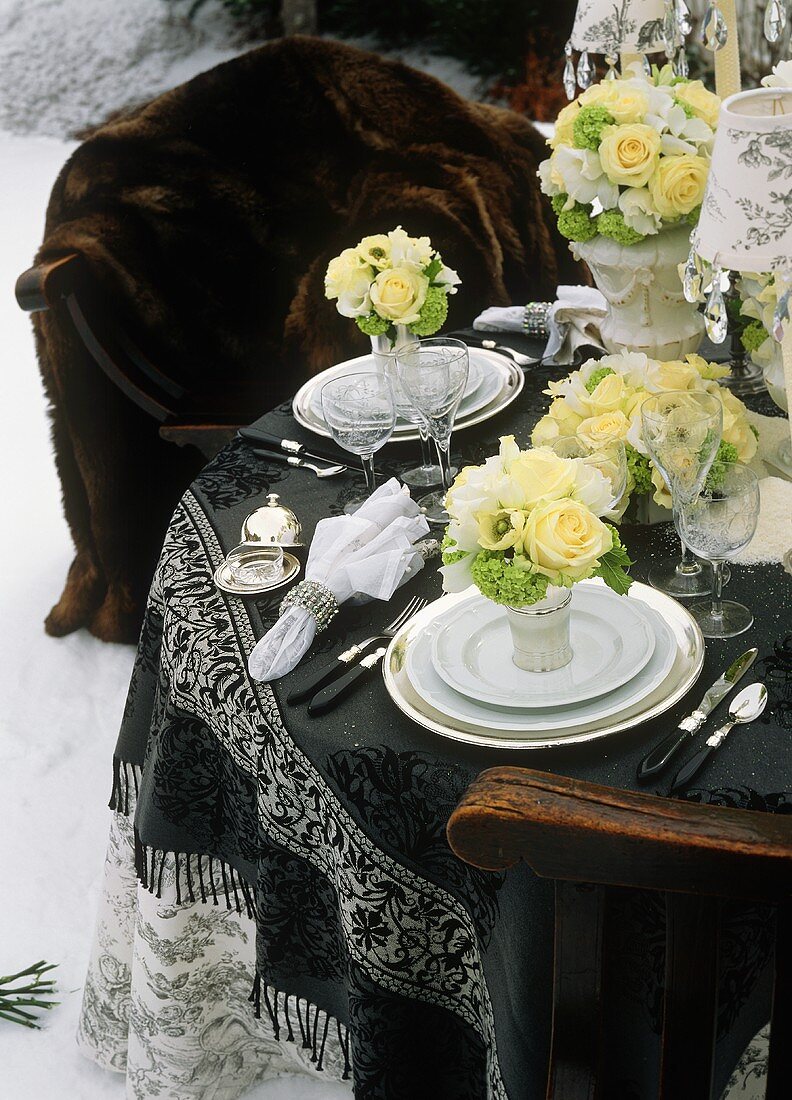 Elegant Winter Table Setting with White Floral Bouquets (San Moritz, Switzerland)