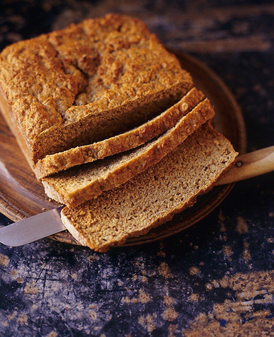 Partially Sliced Irish Soda Bread on a Cutting Board