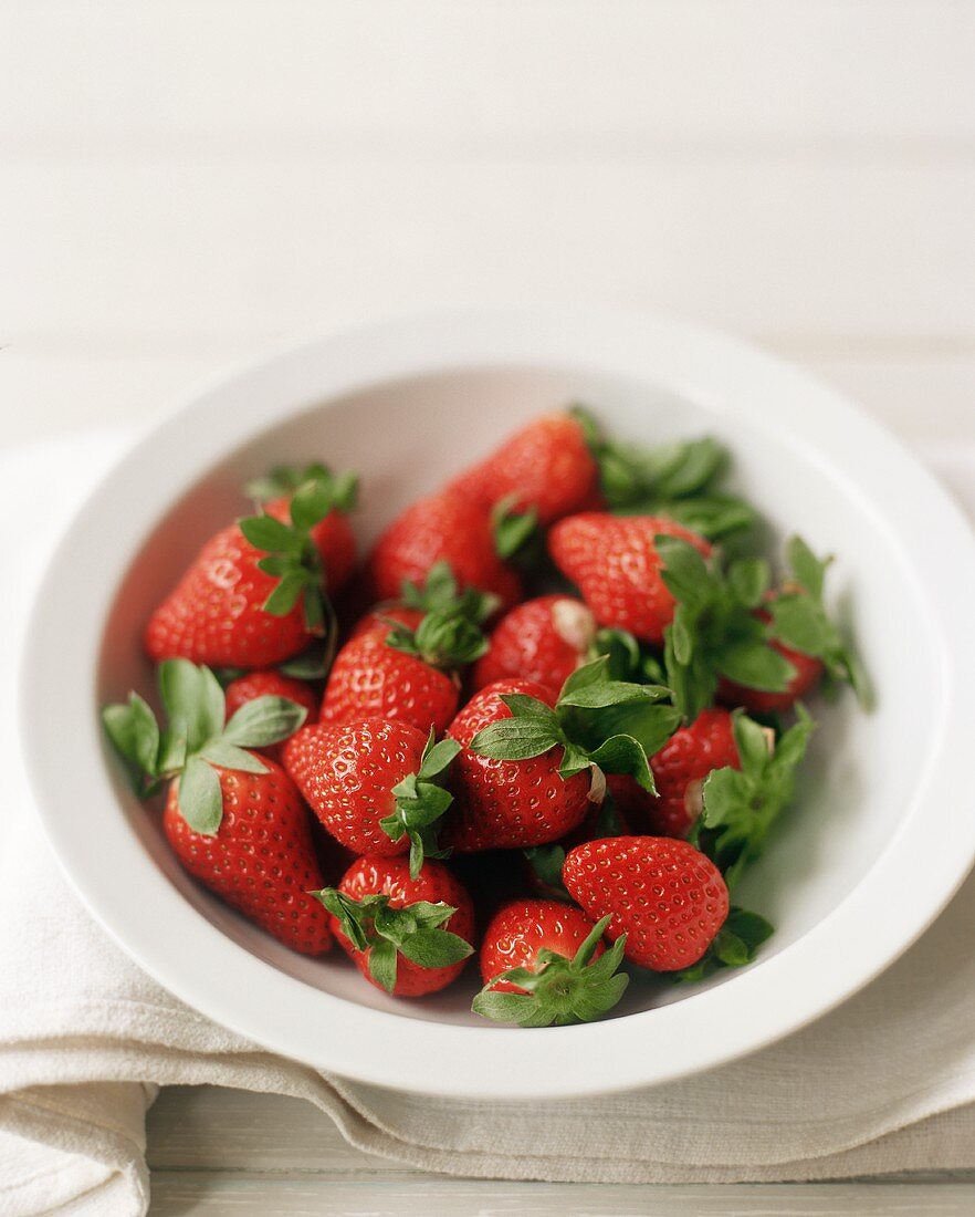 Organic Strawberries in a White Bowl