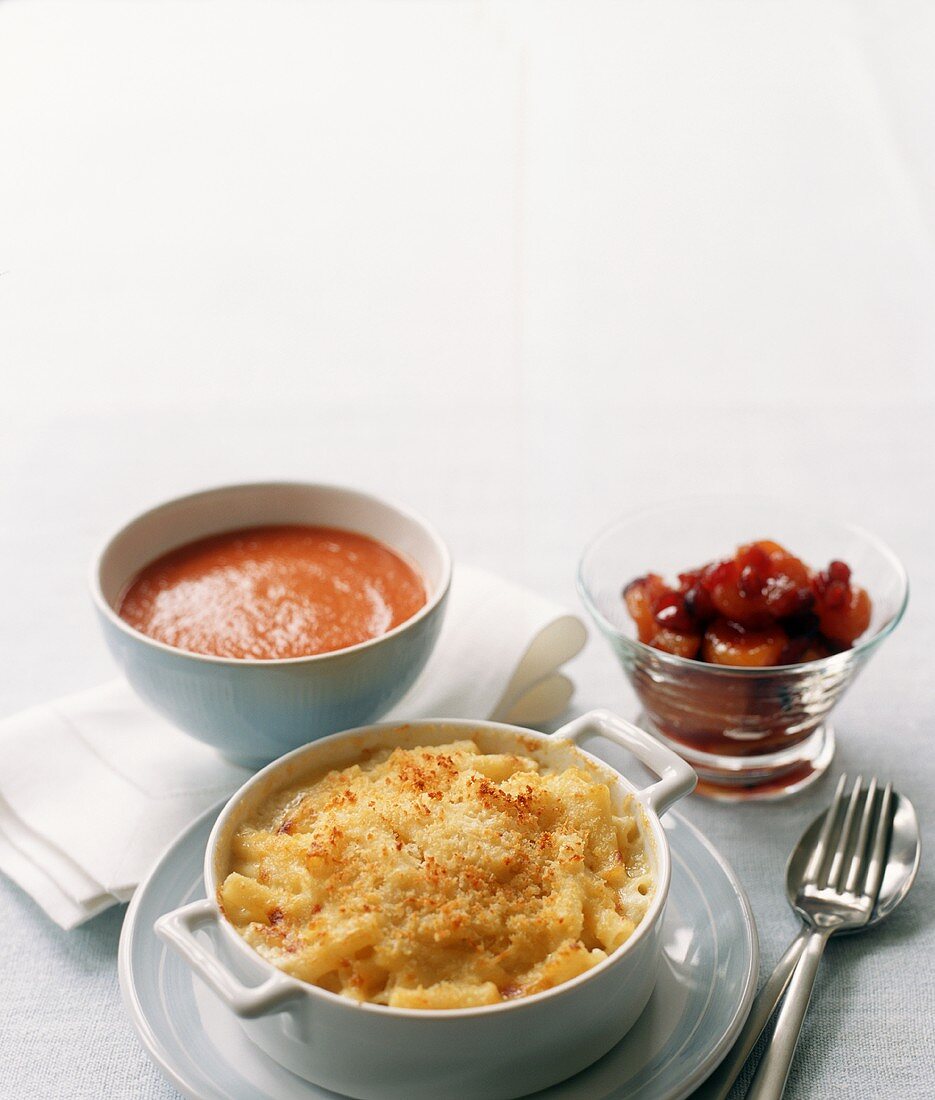 Baked Macaroni and Cheese with a Bowl of Tomato Soup