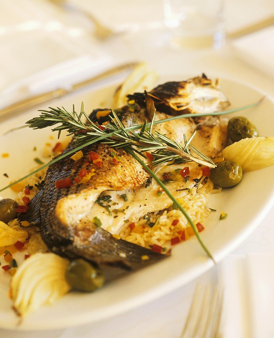 Whole Fish with Onions and Olives; Rosemary Garnish