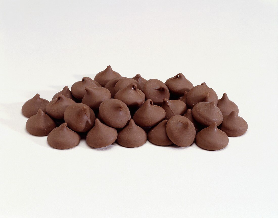 Pile of Chocolate Chips on a White Background