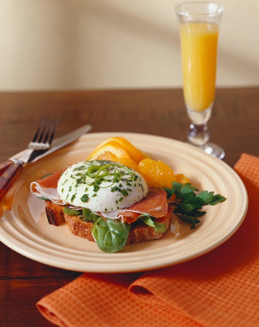 A Poached Egg on Toast with Prosciutto and Spinach