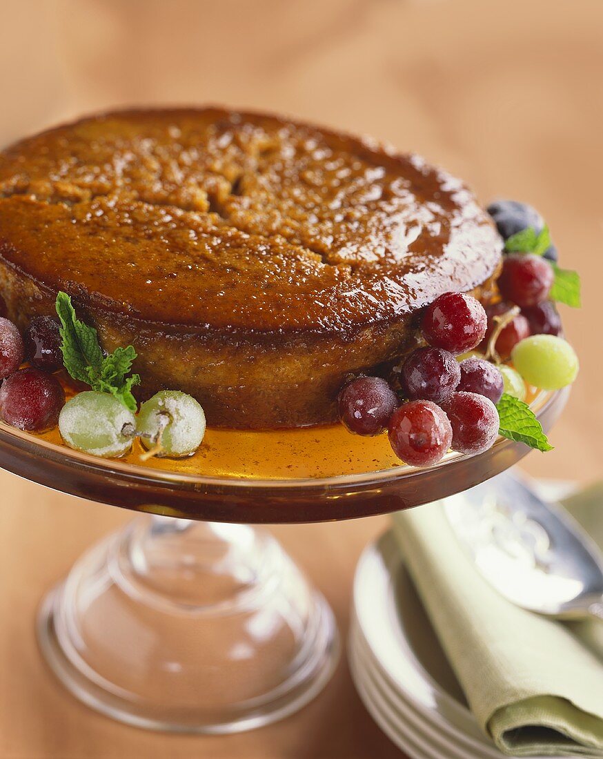 Glazed Spice Cake on a Pedestal with Grapes