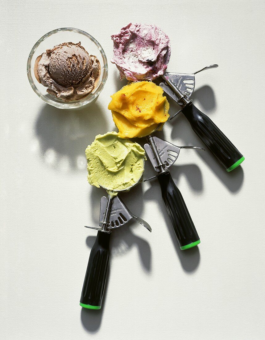 Three Ice Cream Scoops with Ice Cream