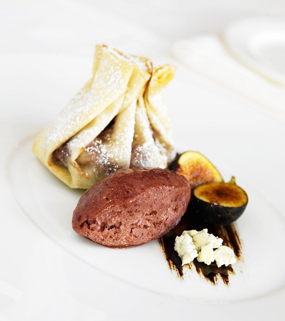 Chocolate Filled Pastry Purse with Raspberry Sorbet, Blue Cheese and Figs