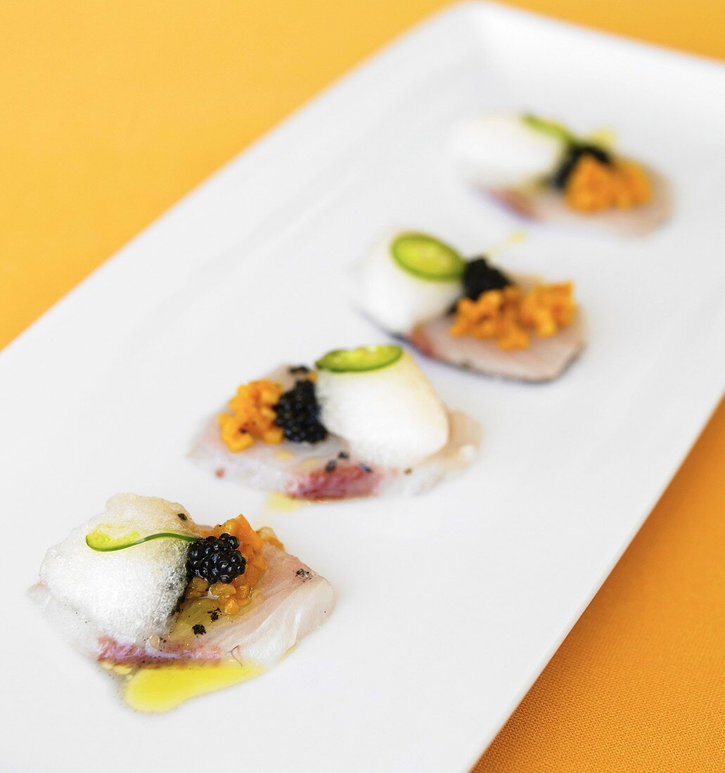 Kampachi Sashimi with Fruit, Caviar and Jalapeno on a Platter