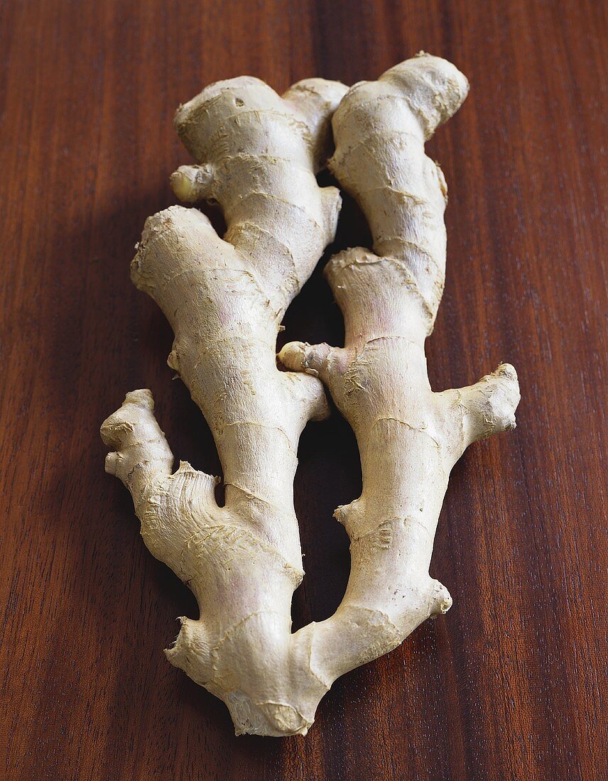 Whole Ginger Root on Wood