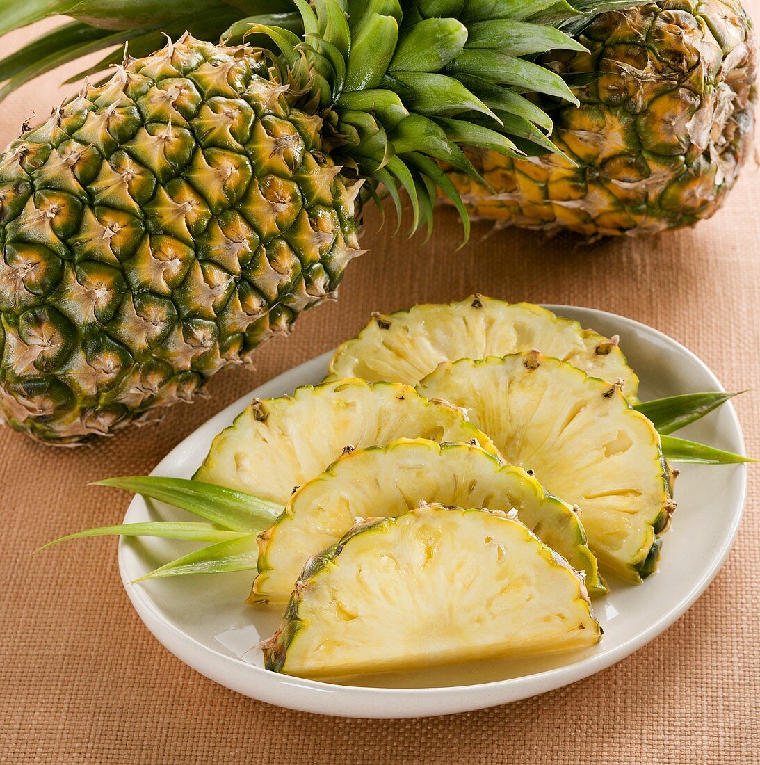 Fresh Pineapple Slices on a Plate, Whole Pineapple