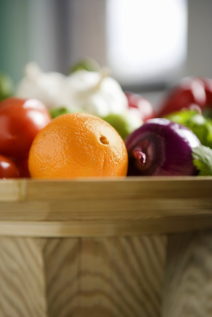 Assorted Fresh Fruit and Vegetables in a Basket
