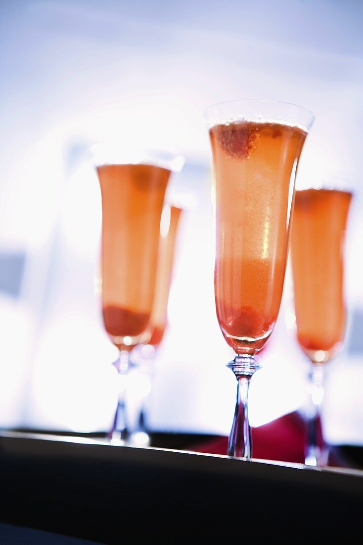 Raspberry Champagne in Flutes