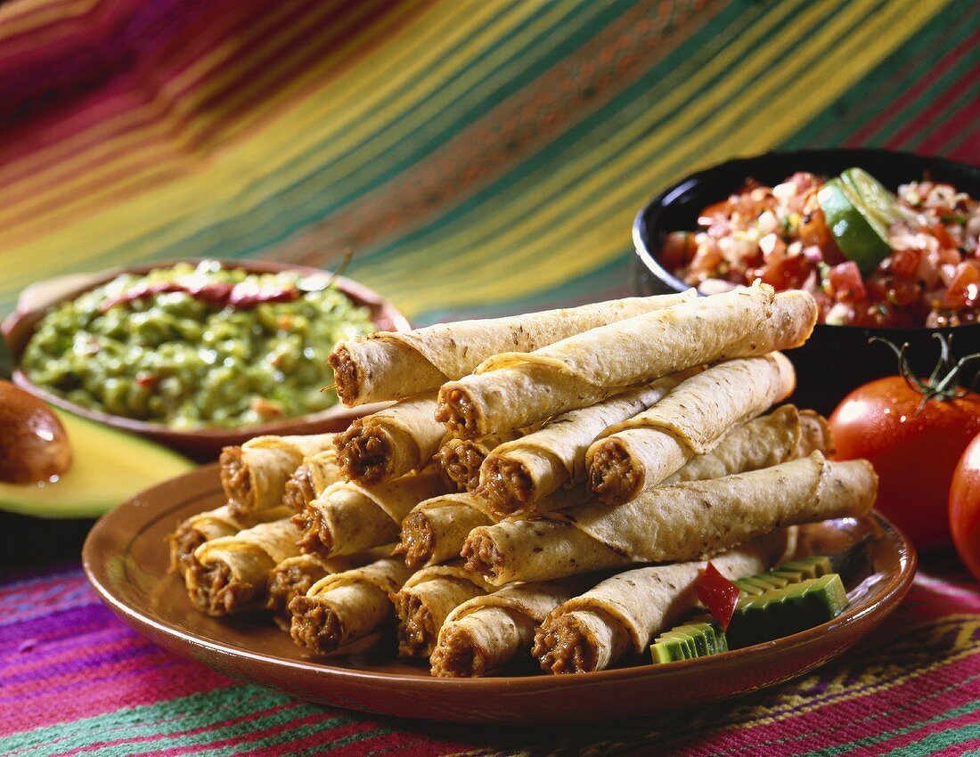 Plate of Taquitos with Guacamole and Salsa