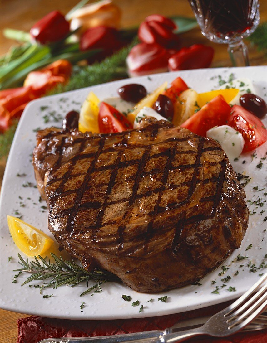 Grilled Steak with Tomato and Olive Salad