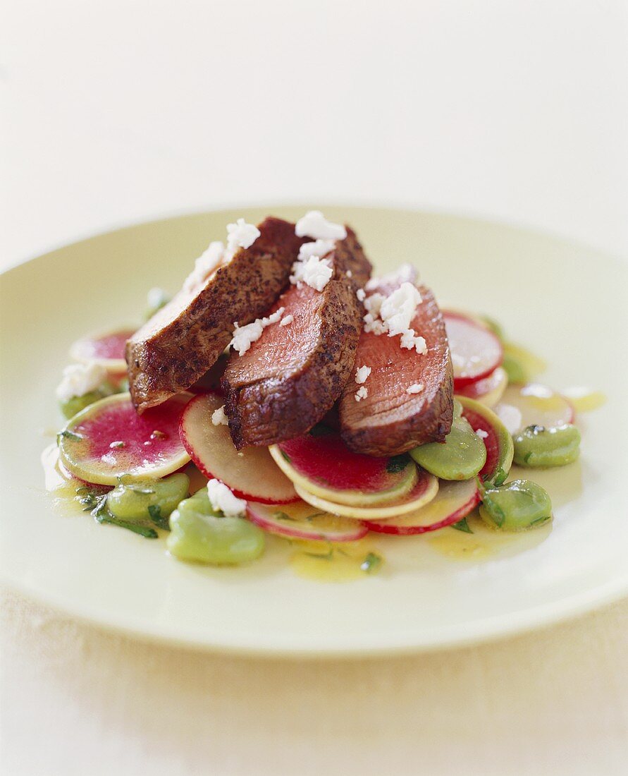 Sliced Steak Over Radishes with Goat Cheese