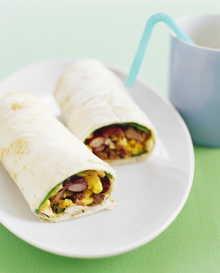 Bean Wrap Halved on a Plate