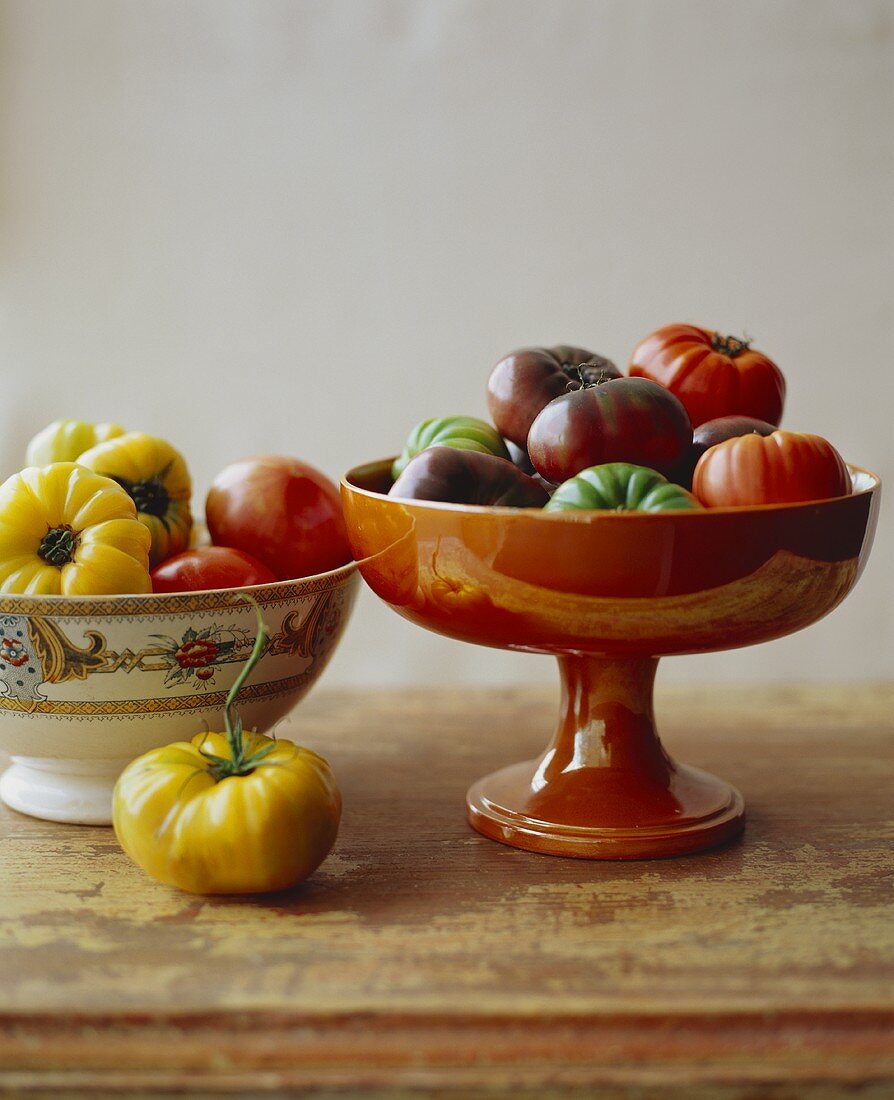 Two Bowls of Various Heirloom Tomatoes