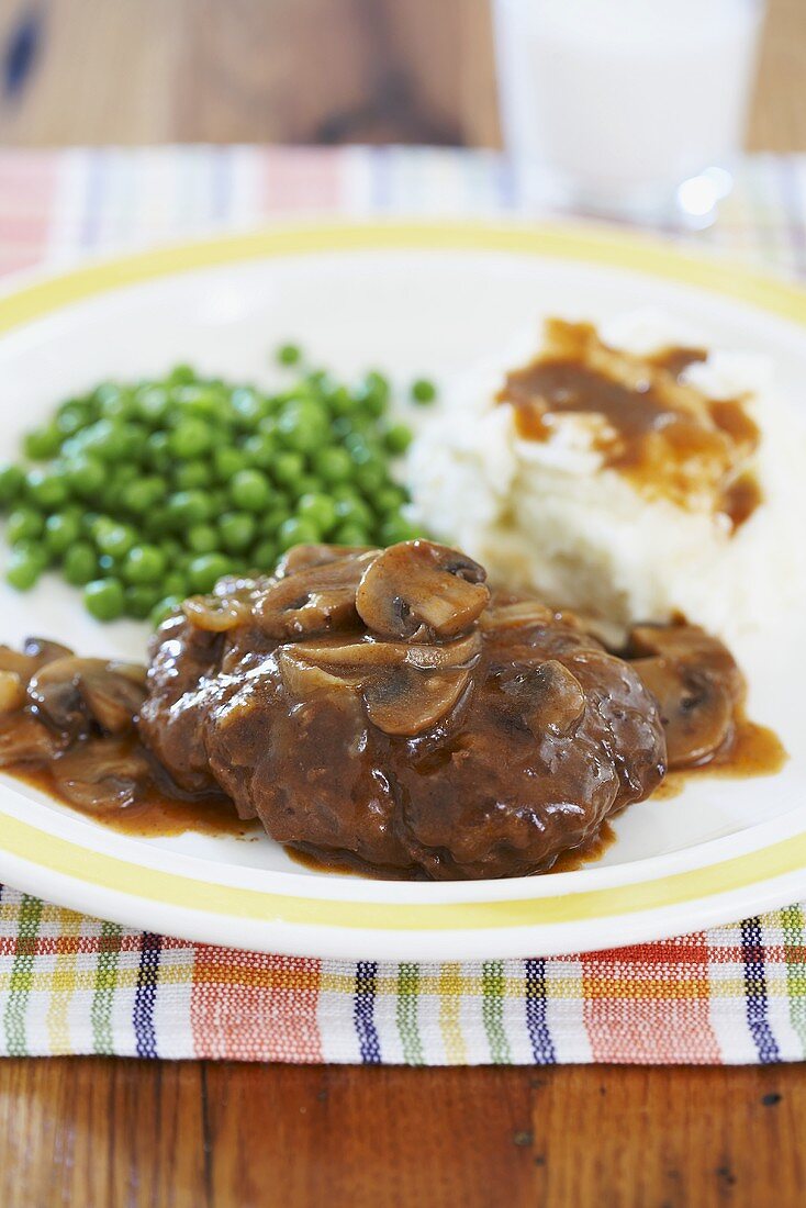 Salisbury Steak with Mushroom Sauce, Mashed Potatoes and Peas