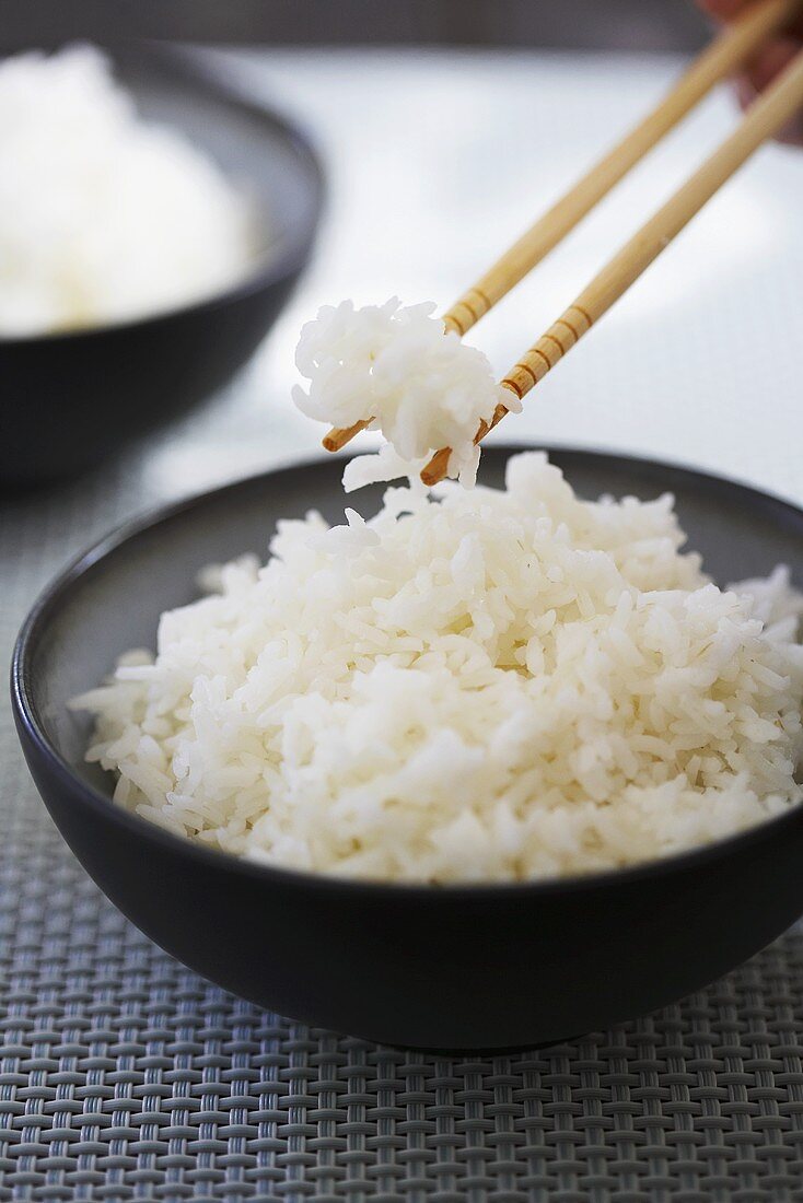 Chopsticks and a Bowl of Sticky White Rice