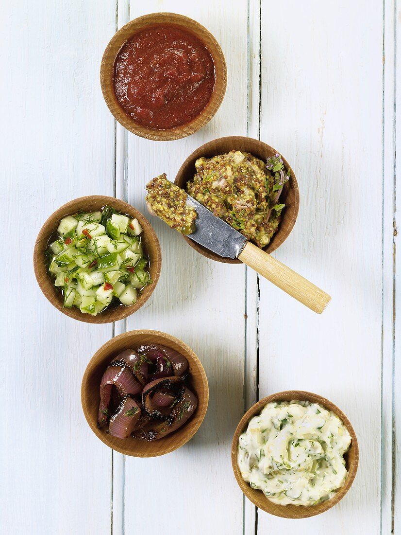 Assorted Toppings for Burgers; Southwestern Aioli with Lime and Jalapeno; Balsamic Grilled Red Onions; Quick Dill Pickle Relish; Spicy Homemade Chipotle Ketchup; Green Peppercorn and Shallot Mustard