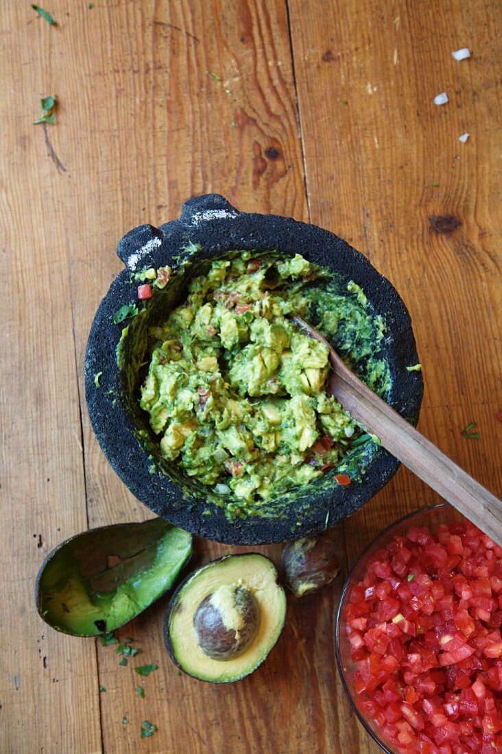 Bowl of Guacamole with Avocado and Tomato