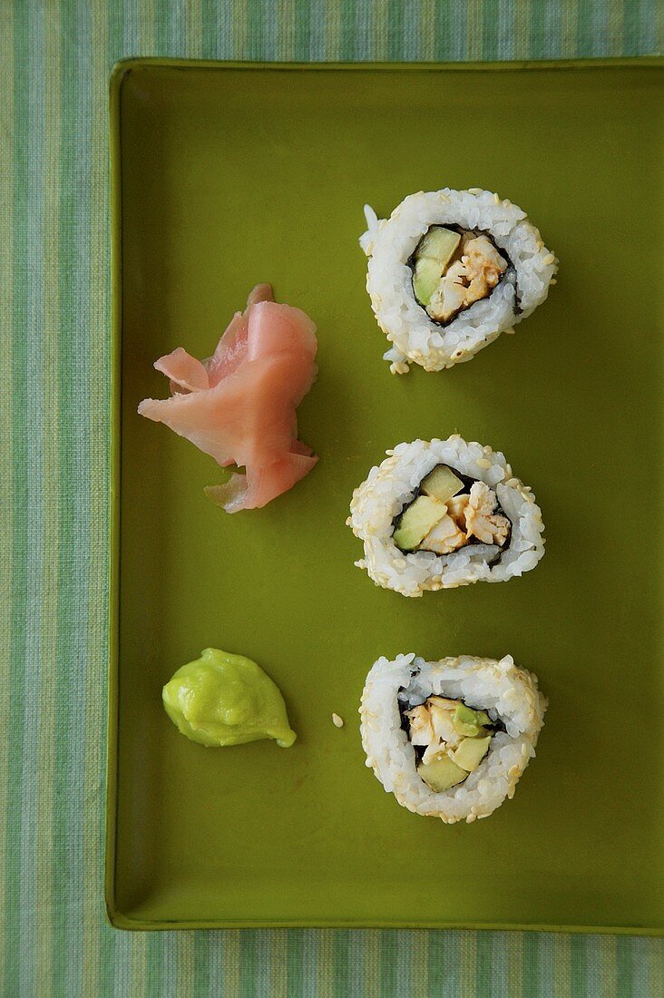 California Rolls on a Tray with Pickled Ginger and Wasabi