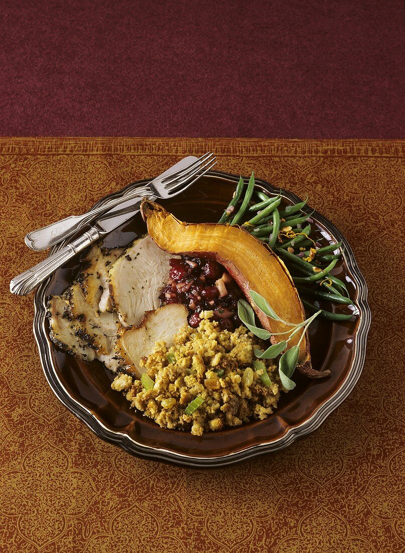 Thanksgiving Plate with Sliced Turkey and Sides