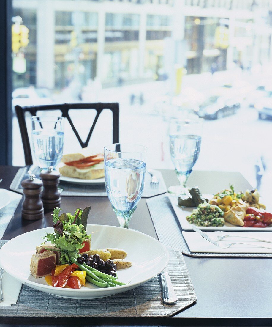 Three Assorted Lunch Plates on Restaurant Table