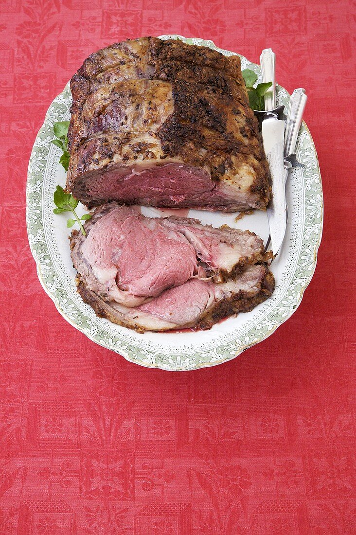 Partially Sliced Prime Rib on a Platter