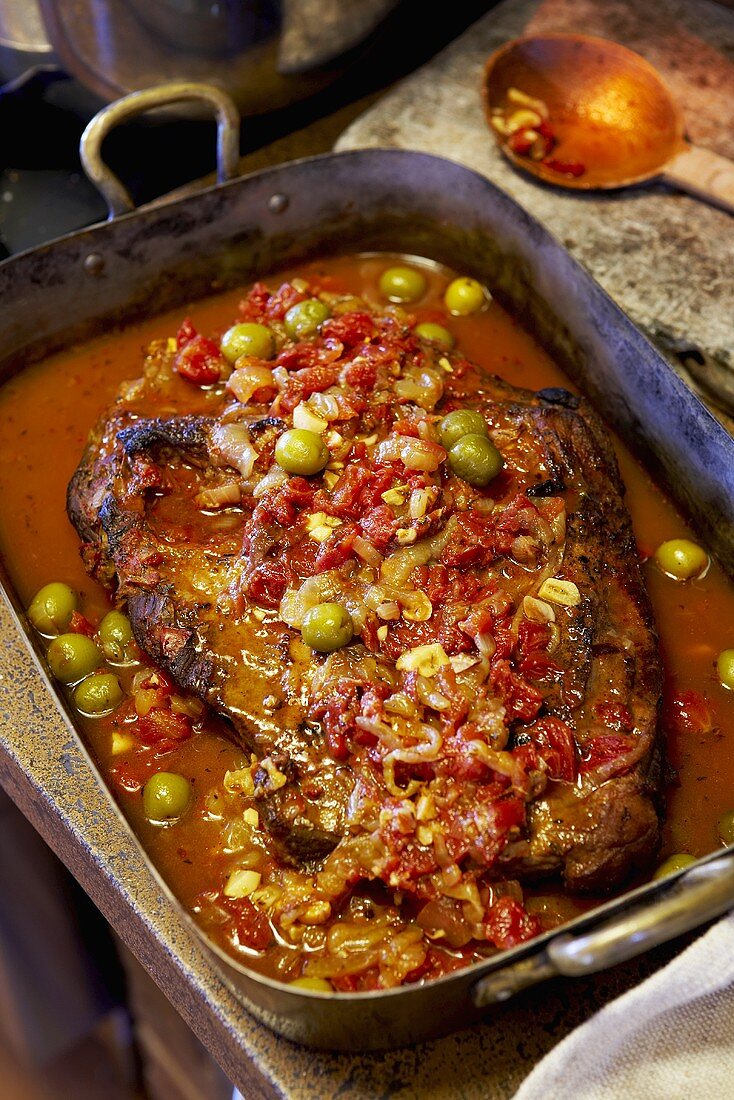 Beef Brisket in Pan with Tomatoes and Olives
