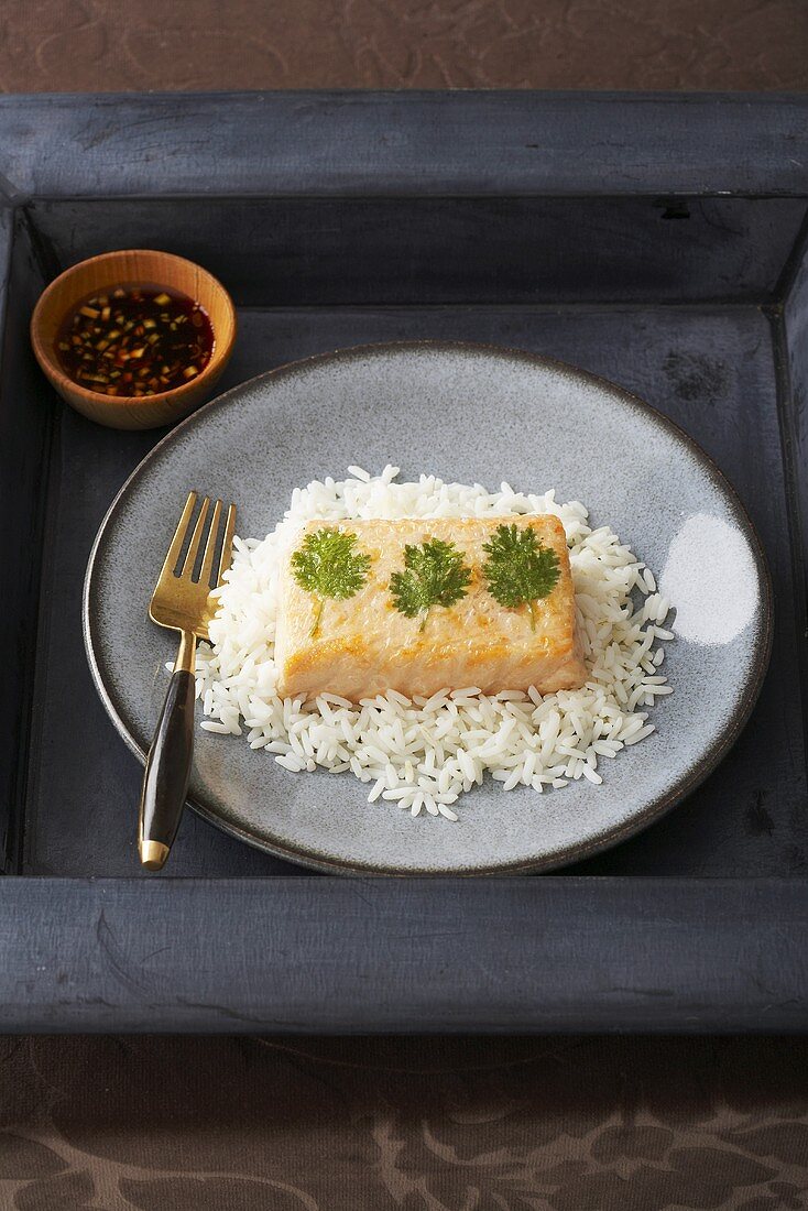 Salmon Wrapped in Rice Paper Over Rice