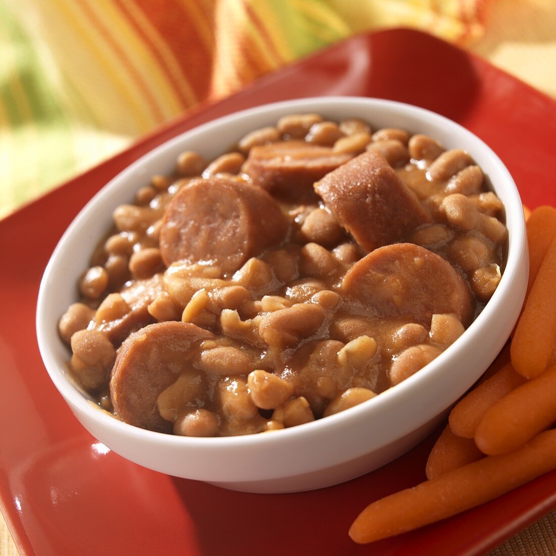 Bowl of Beans and Franks with Baby Carrots