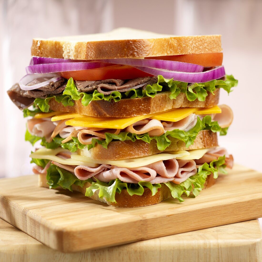 Club Sandwich with Ham, Turkey, Roast Beef, Cheddar and Swiss Cheese