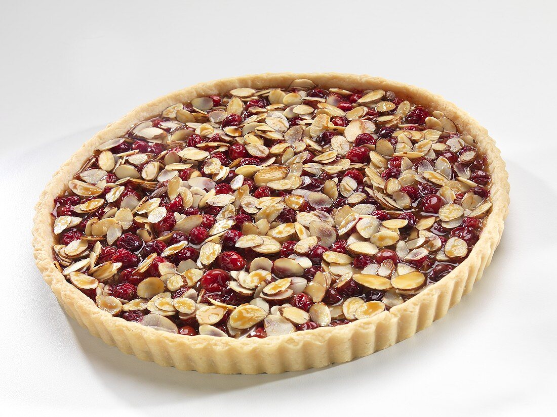 Whole cranberry almond caramel tart