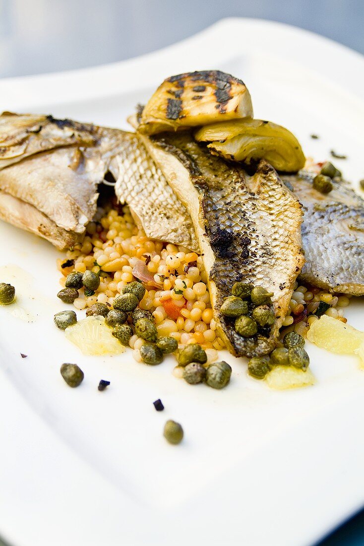 Wood-Fired Bronzini with Fennel and Couscous Pine Nut Salad