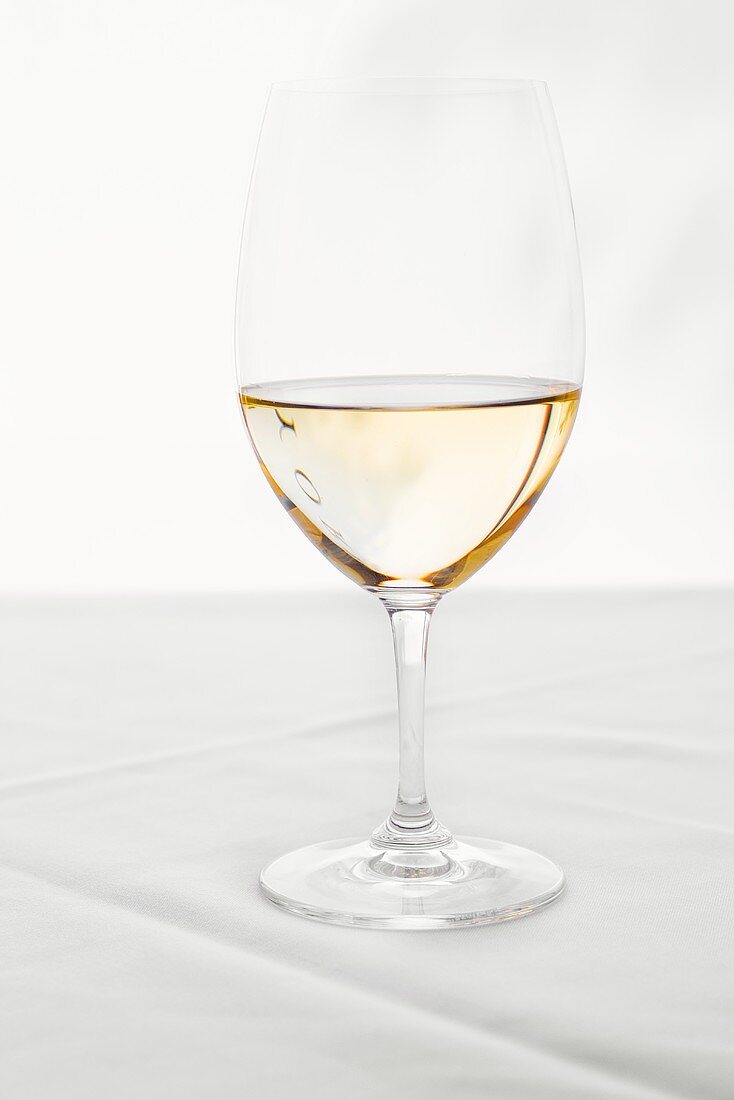 Glass of White Wine on White