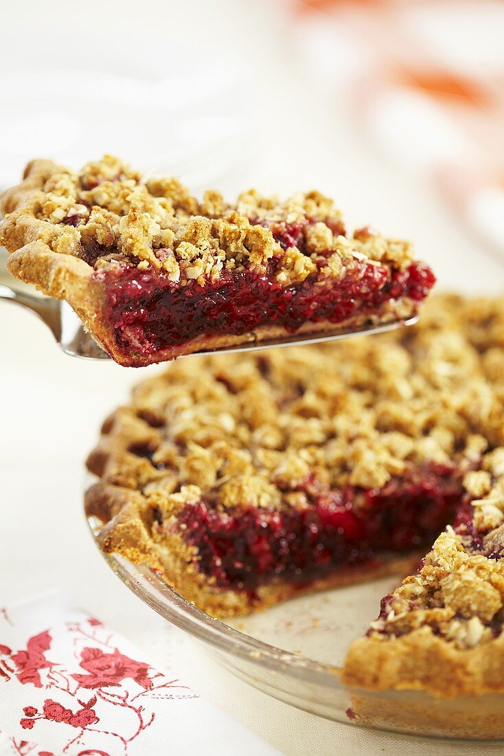 Removing Slice of Berry Streusel Pie