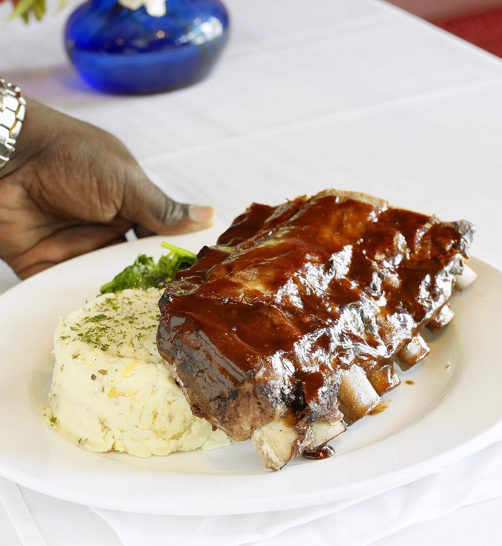 Barbecue Ribs with Mashed Potatoes and Greens