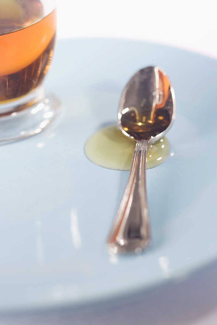 Agave Syrup Spilling From Spoon