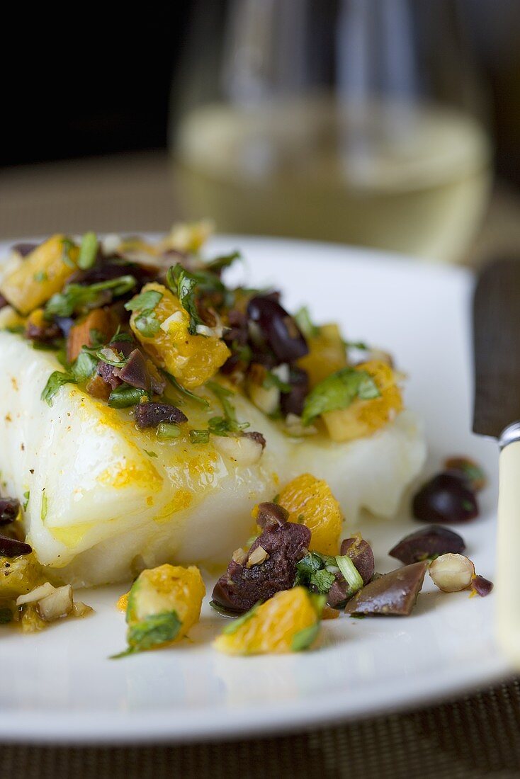 Chilean Sea Bass with Kalamata Olives, Orange Pieces and Herbs