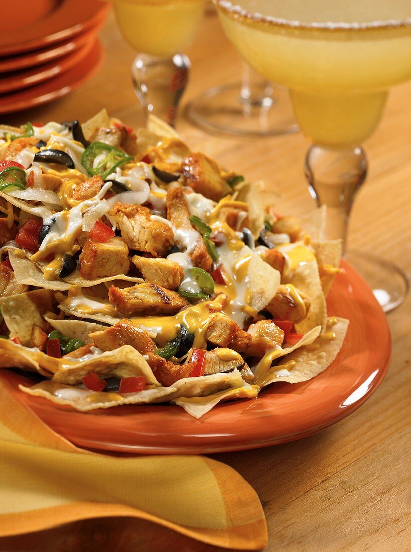 Plate of Chicken Nachos with Margaritas