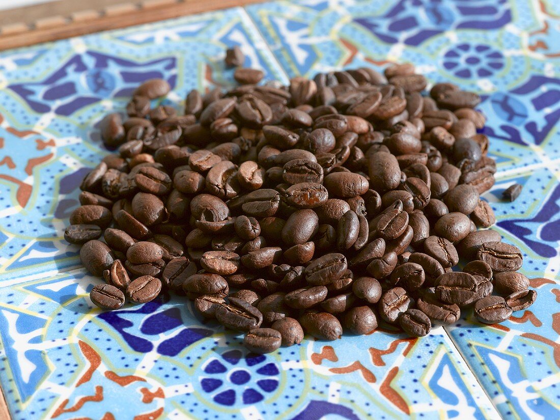 Roasted Coffee Beans on Mosaic Tile