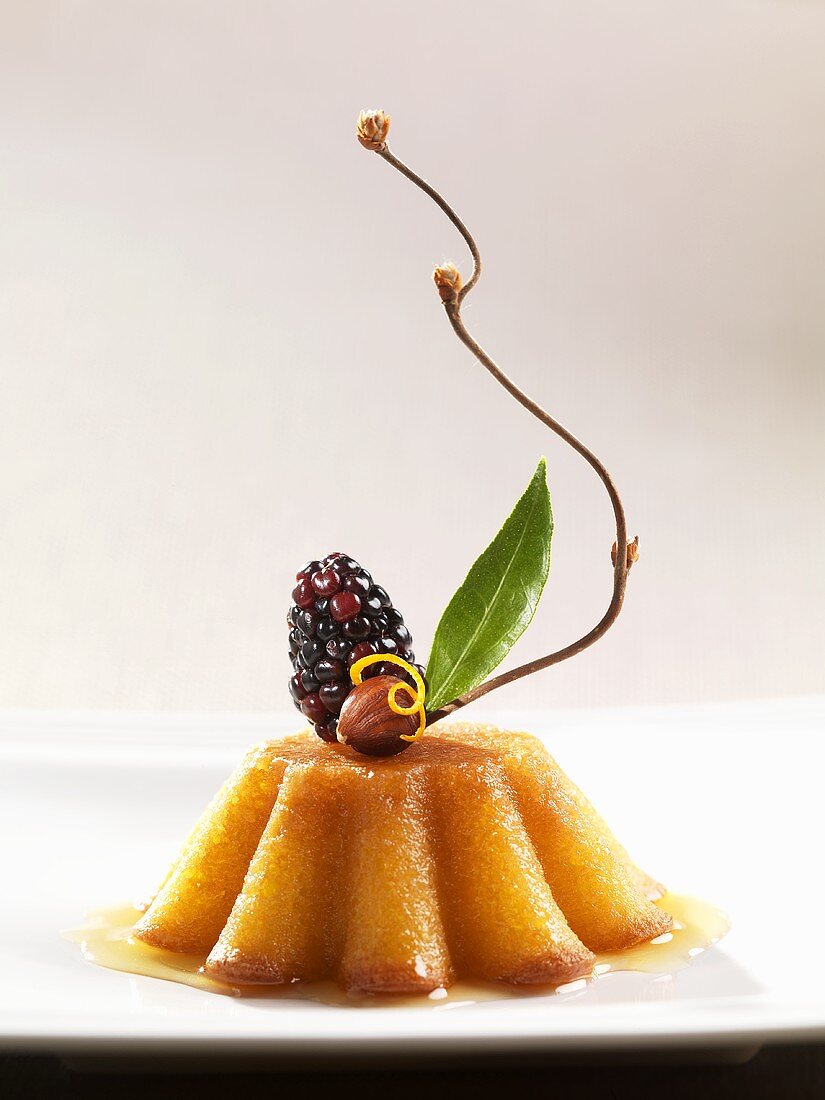 Orange Cake with Citrus Syrup, Garnished with Fruit and Sprig