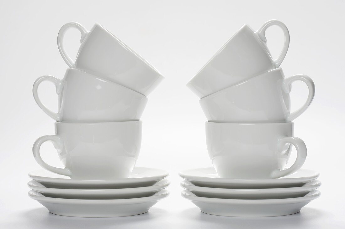 Two Stacks of Coffee Cups and Saucers