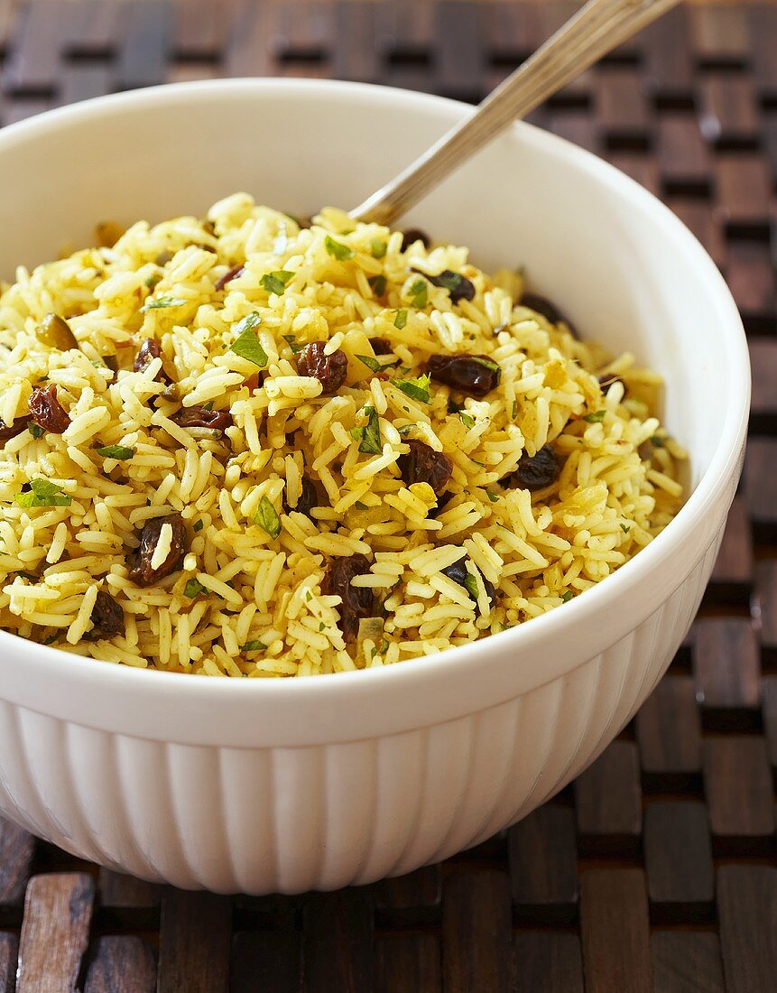 Bowl of Curried Rice Salad with Raisins