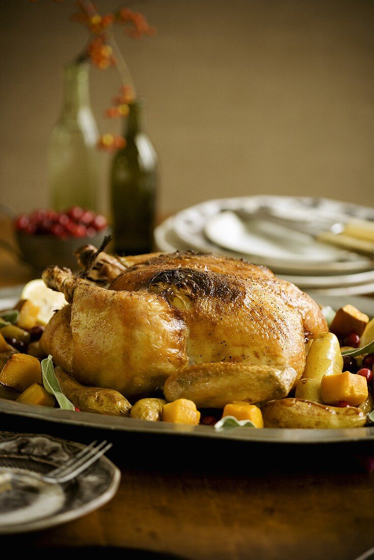 Rustic Roast Chicken with Vegetables on Table