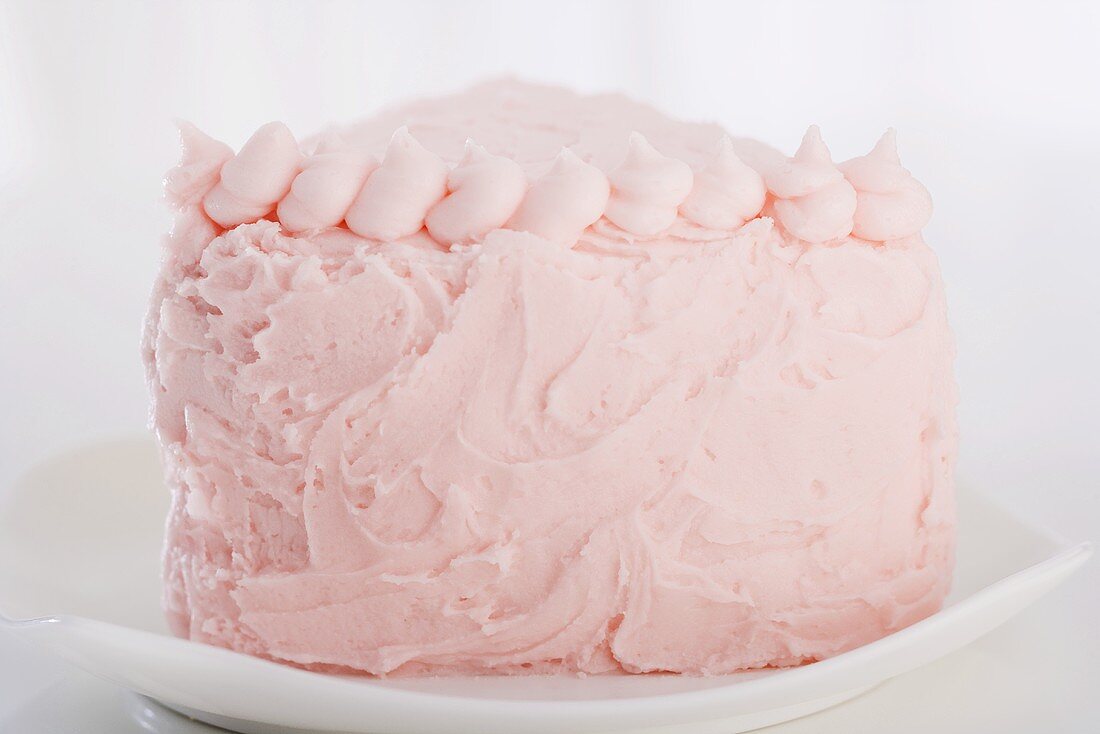 Cake Decorated with Strawberry Frosting