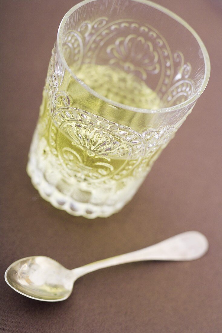 Glass of Absinthe; Spoon